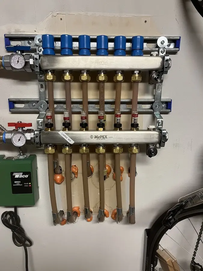 Plumber performing Water Heater Repair at a residential property in Kingsland